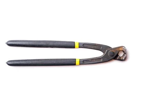 Rusty pincers with plastic handle Stock Photos