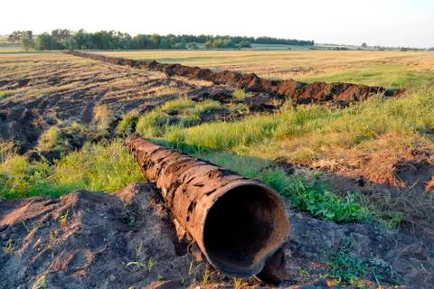 Rusty pipe, large pipe, ditch Stock Photos