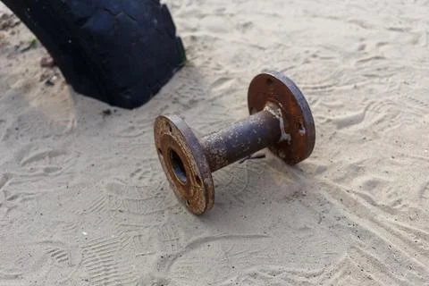 Rusty Pipe on Sand Stock Photos
