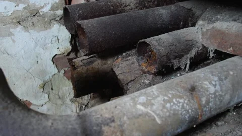 Rusty pipes of the old heating system Stock Footage 283292714