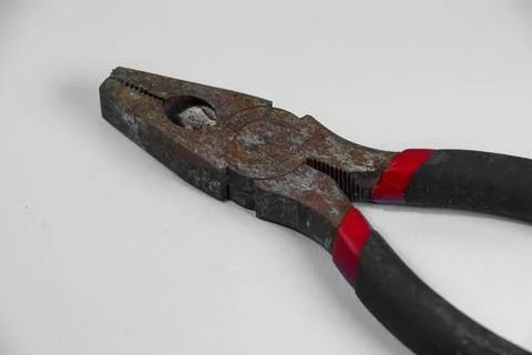Rusty pliers isolated on white background Stock Photos