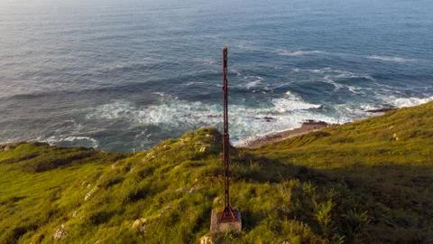 Rusty Pole Next to Sea Stock Photos
