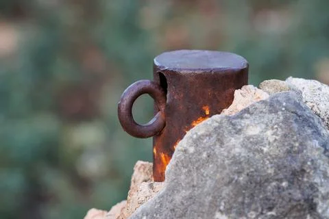 Rusty post with a ring to attach a chain Фото