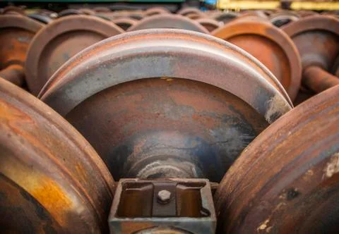 Rusty Rail Wheels - Tain Yard - Junk Yard - Storage Yard - Symmetrical Stock Photos