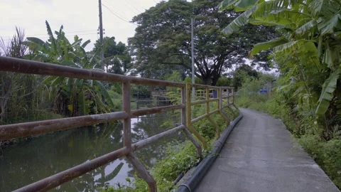 Rusty Railing along Canal Side Walkway Video stock 338342785