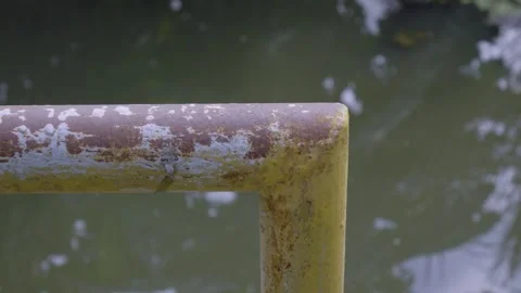 Rusty Railing Detail of Canal Side Walkway Stock Footage 338342847