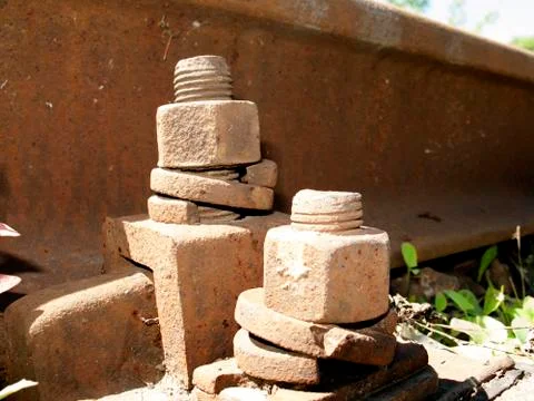 Rusty raiway section and rusty rail fastening Stock Photos