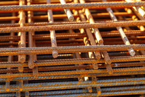 Rusty rebar mesh reinforcement for construction industry Stock Photos