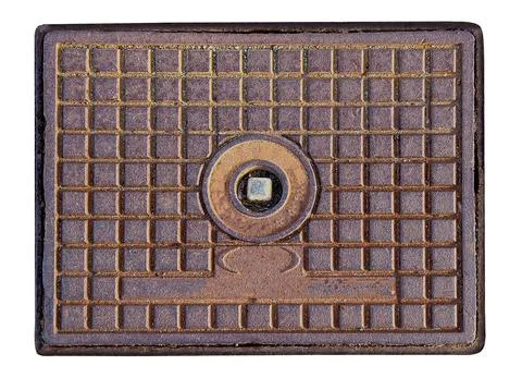 Rusty rectangular manhole cover with square grid pattern Foto stock