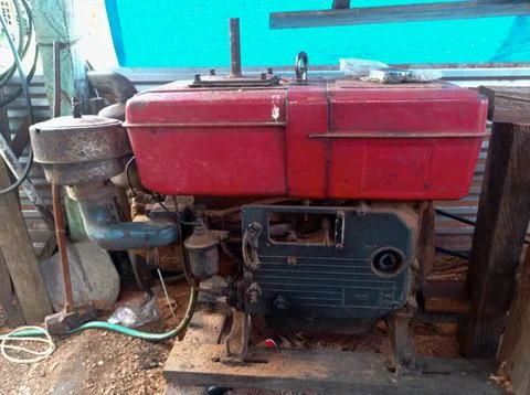 A rusty red black diesel engine Stock Photos