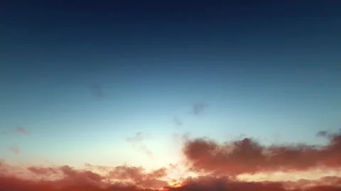 Rusty red magenta storm clouds blue sky dusk sunset time lapse seamless loop Video stock 159707010
