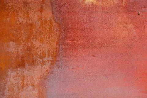 Rusty red painted flat sheet metal surface full-frame background and texture Stock Photos