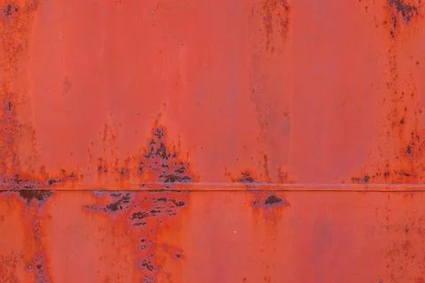 Rusty red painted flat sheet metal surface full-frame background and texture 库存照片