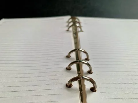 Rusty Ring Binder on Open Blank Notebook Closeup Jakarta Indonesia Stock Photos