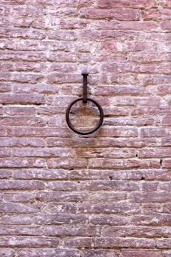 Rusty ring on a brick wall Stock Photos