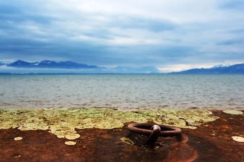 Rusty ring at the pier Stock Photos