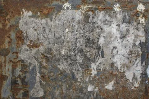 Rusty Ripped Paper Billboard Texture on Rusted Metal Surface Stock Photos
