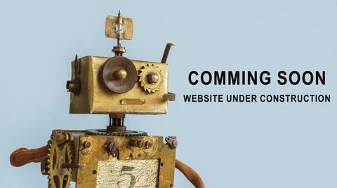 Rusty robot and sign Website coming soon. Under construction. Stock Photos