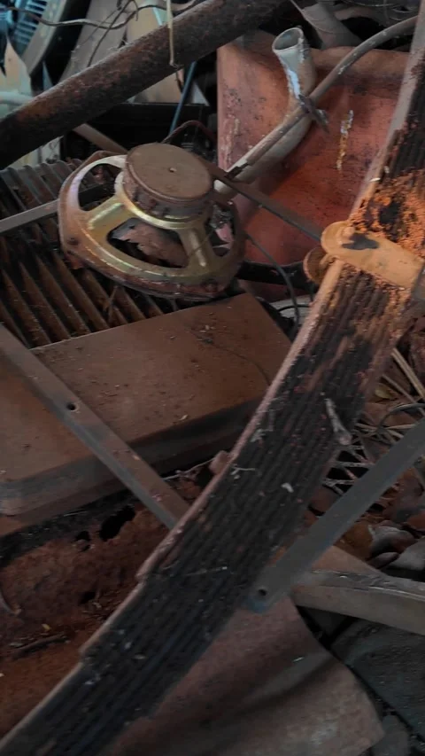 Rusty Scrap Metal, 4k Vertical Video Industrial Waste Smoke Slider Left to Right Stock Footage 323734493