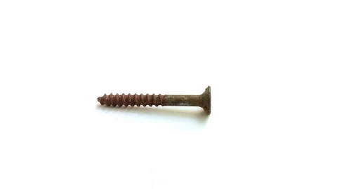 Rusty screw on a white background 스톡 동영상 313815165