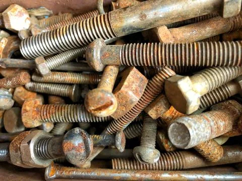Rusty screws and tools close-up. Rusty nails background Stock Photos