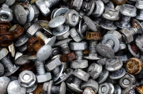 Rusty screws in a mess Stock Photos