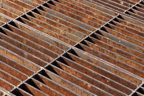 Rusty sewer grate Stock Photos