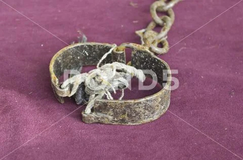 Rusty shackle exposure of torture, inquisition Stock Photos