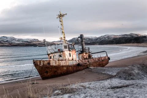 Rusty ship on the coast in the Arctic Stock Photos