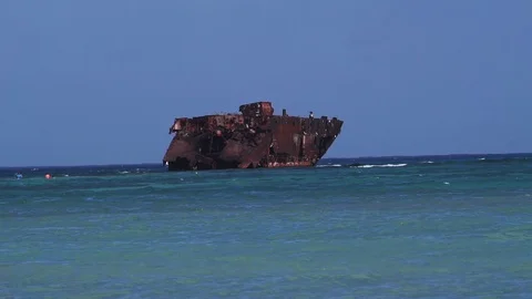 Rusty ship in the middle of the ocean Stock Footage 102133458