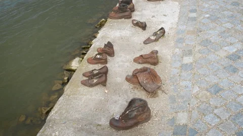 Rusty shoes on the parapet by river. 動画素材 260352959