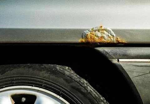 Rusty side of the car Stock Photos