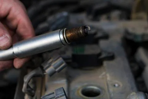 Rusty spark plug. Аctuator. Foto stock