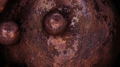 Rusty sphere with rolling small weathered metal spheres looping 3D animation 스톡 동영상 194399724