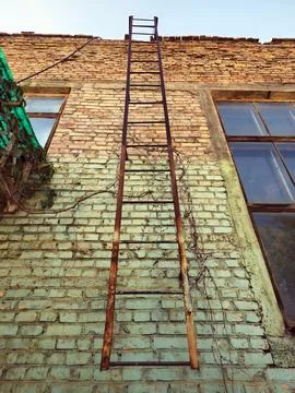Rusty stairs to the top. Stock Photos