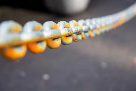 Rusty but sturdy security chain Stock Photos