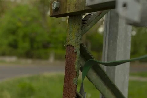 Rusty support held by temporary fastening used by grounds team Stock Photos