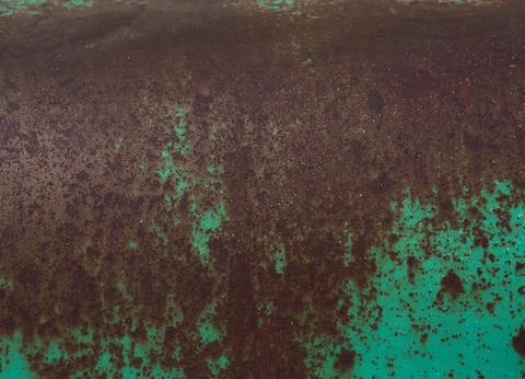 Rusty surface with exfoliated paint using as background Stock Photos
