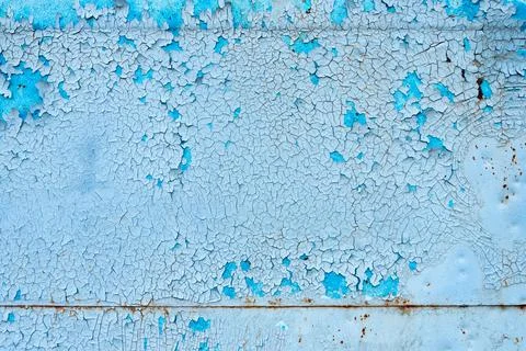 Rusty surface texture. Peeling blue paint. Background Stock Photos