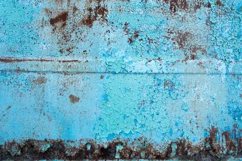Rusty surface texture. Peeling blue paint. Background Stock Photos