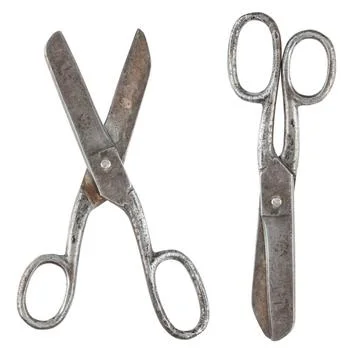 Rusty tailor scissors Rusty tailor scissors in closed and opened form isol... Stock Photos