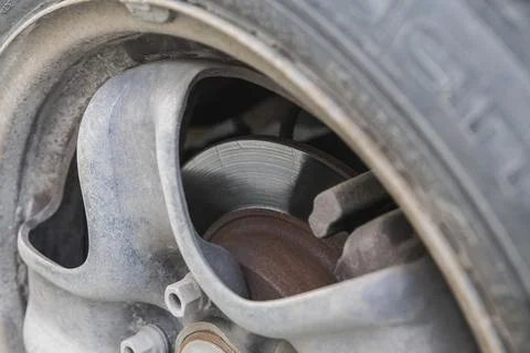 Rusty threadbared brake disc in a car Stock Photos