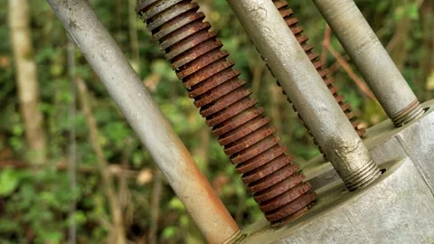 Rusty threaded bolt of an engineering mechanism outdoor Stock Footage 252595745