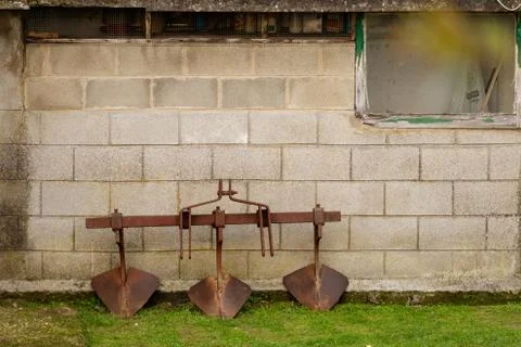 Rusty three blade plough attachment in Spain Stock Photos