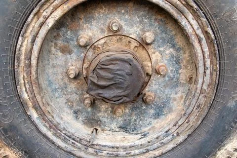 Rusty Tire Close-Up with Visible Nuts - 4K Texture Stock Photos
