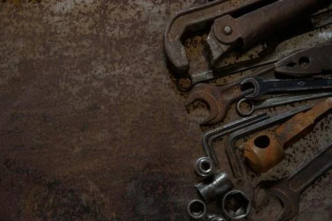Rusty tools on rusty metal Stock Photos