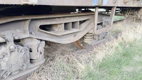Rusty train wagon wheel suspension mechanism detail Stockbeeldmateriaal 333655277