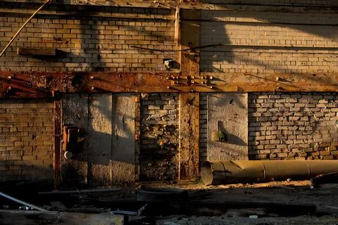 Rusty Wall Background with Brickwork and Beams Stock Photos