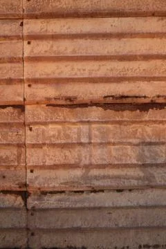 Rusty wall on street Stock Photos