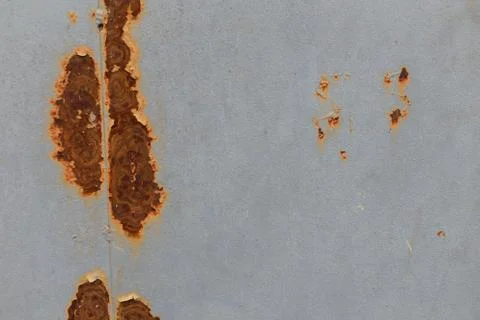 Rusty wall texture with peeling off paint remains. Background or backdrop. Foto stock
